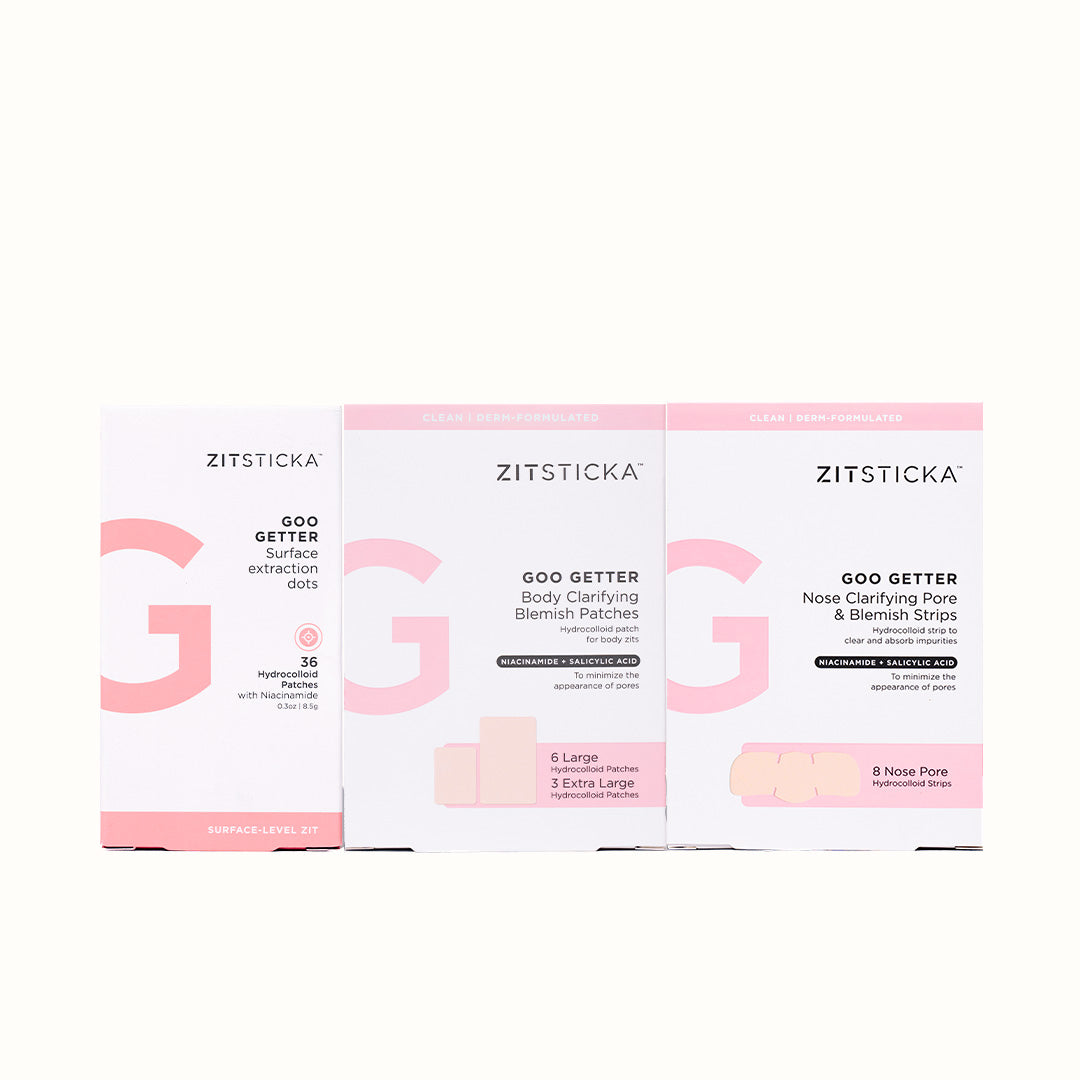 Three SUCKS TO BE GOO Bundle boxes with minimalist pink and white packaging, side by side.