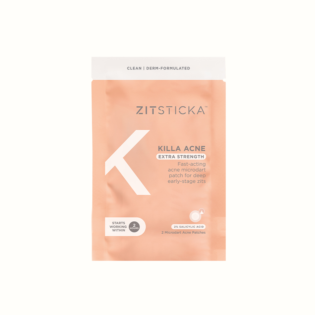 Peach-colored Zit Stoppers acne patches pouch with white text and product details on the front.