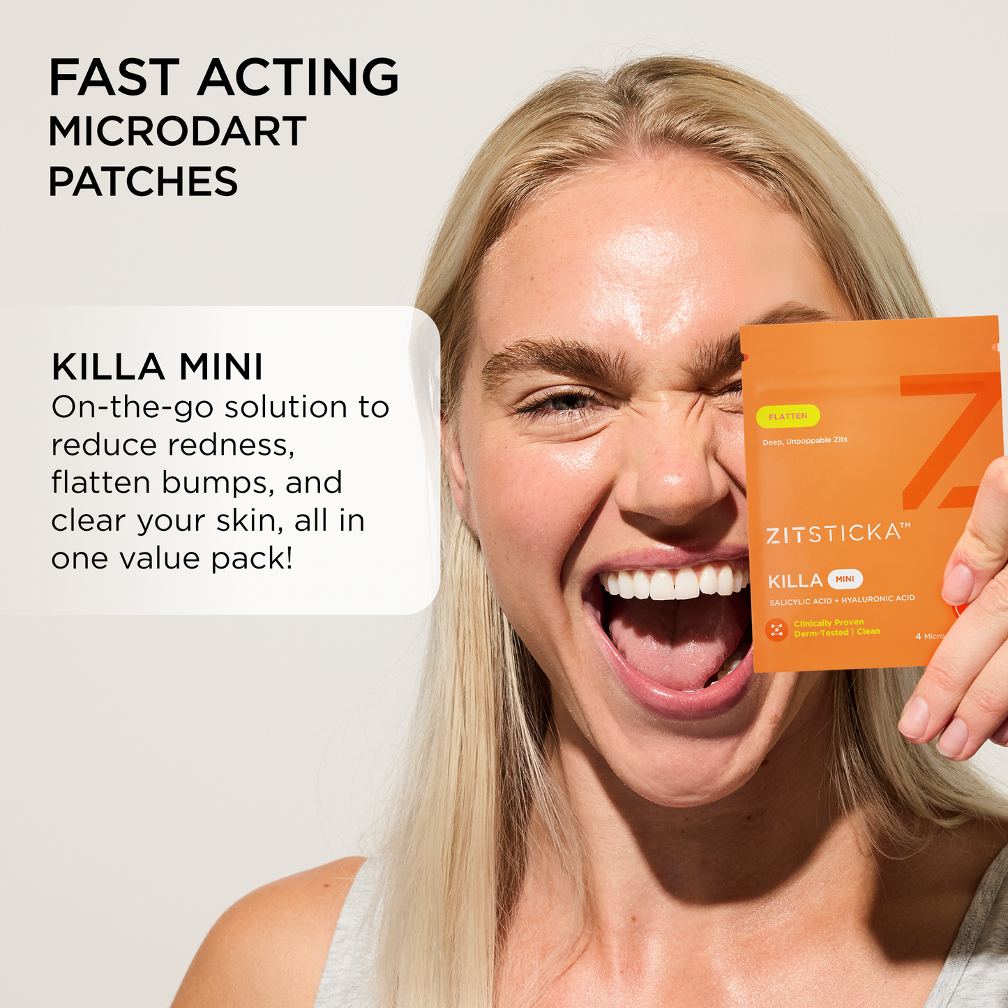 Smiling woman holds KILLA Mini Microdart Pimple Patches; text highlights fast-acting spot control.