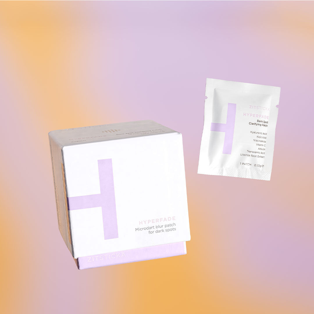 White box and sachet of PATCH IT UP microdart patch for post-zit dark spots on peach background.