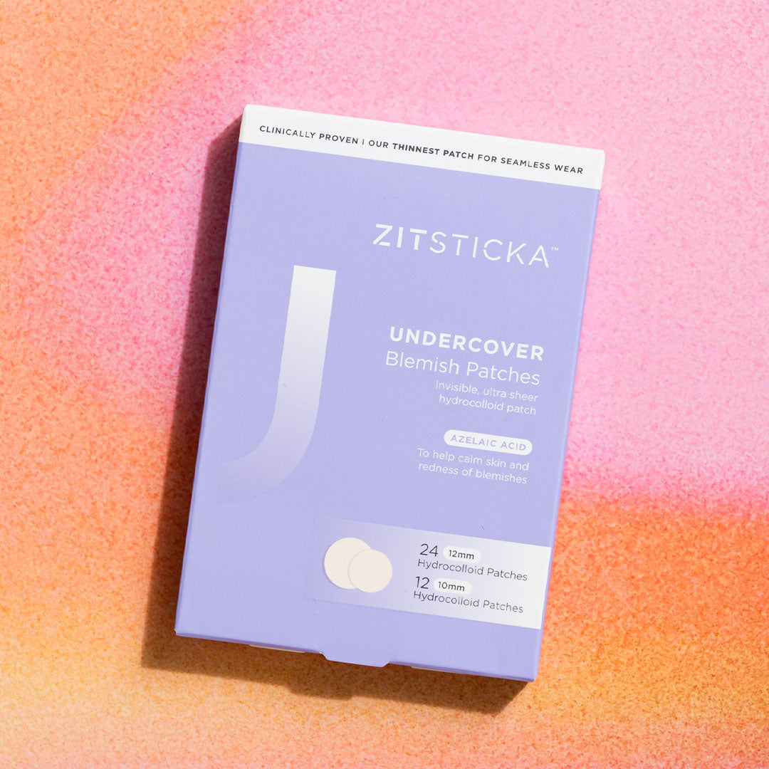 The UNDERCOVER Blemish Patches Quarterly 3 Pack Bundle on a pink and orange textured background.