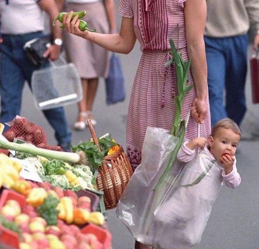 Baby in a shopping bag