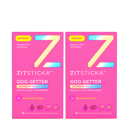 Two pink Goo Getter DreamHolo Collection boxes with holographic pimple patches and a yellow Z.