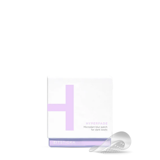 A white and lavender box of HYPERFADE Microdart Blur Patches for clearer-looking skin in front.