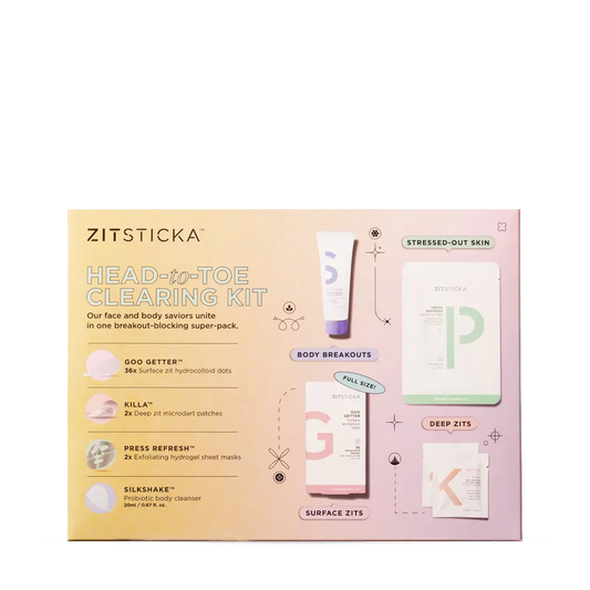 Head-to-toe Clearing Kit with pimple patches and a probiotic body cleanser inside the box.