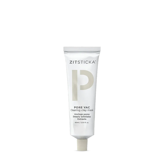 A tube of PORE VAC Clearing Clay Mask for congested skin stands upright on a white background.
